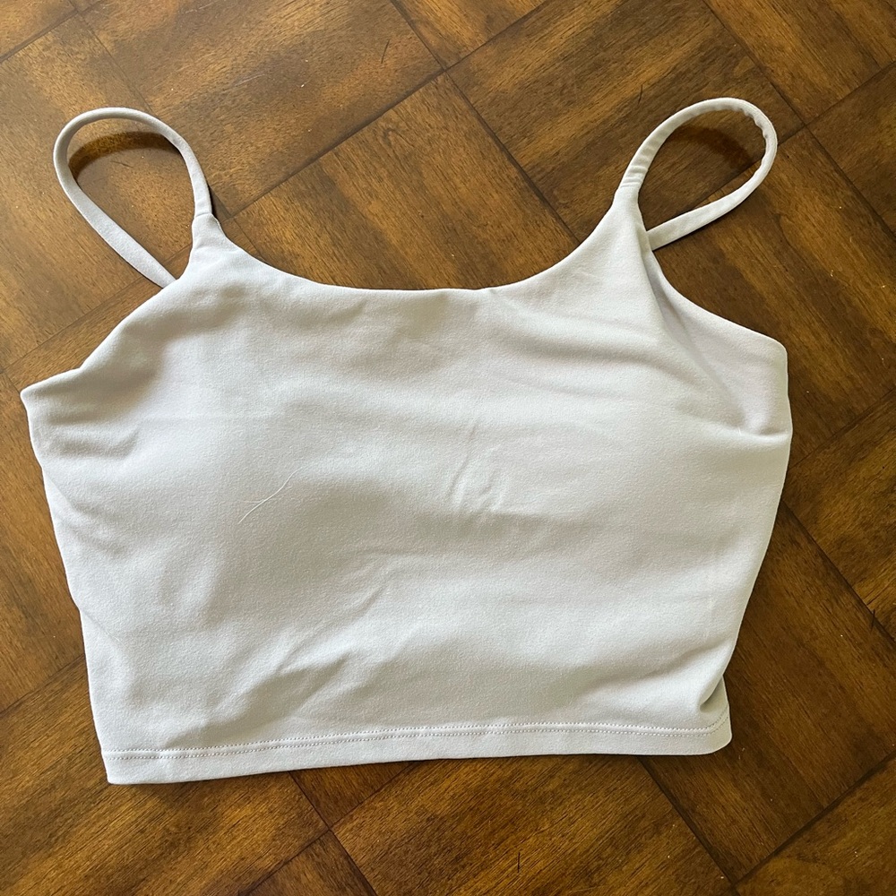 Size medium sports bra with optional removable pads very good shape